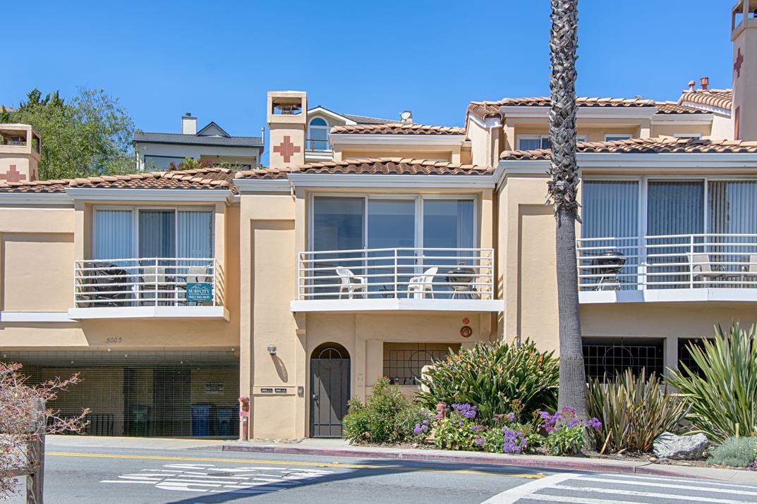 5005 Cliff Drive, Unit 2 Capitola, CA 95010 - Photo 1 of 21 a view of a building with a tree and front door