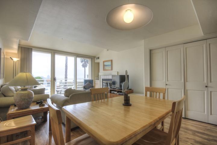 5005 Cliff Drive, Unit 2 Capitola, CA 95010 - Photo 6 of 21 a view of a dining room with furniture and wooden floor