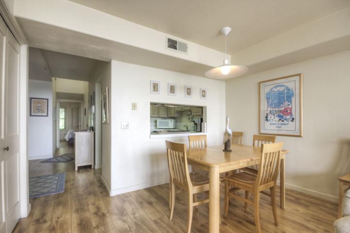 5005 Cliff Drive, Unit 2 Capitola, CA 95010 - Photo 7 of 21 a view of a dining room with furniture and wooden floor