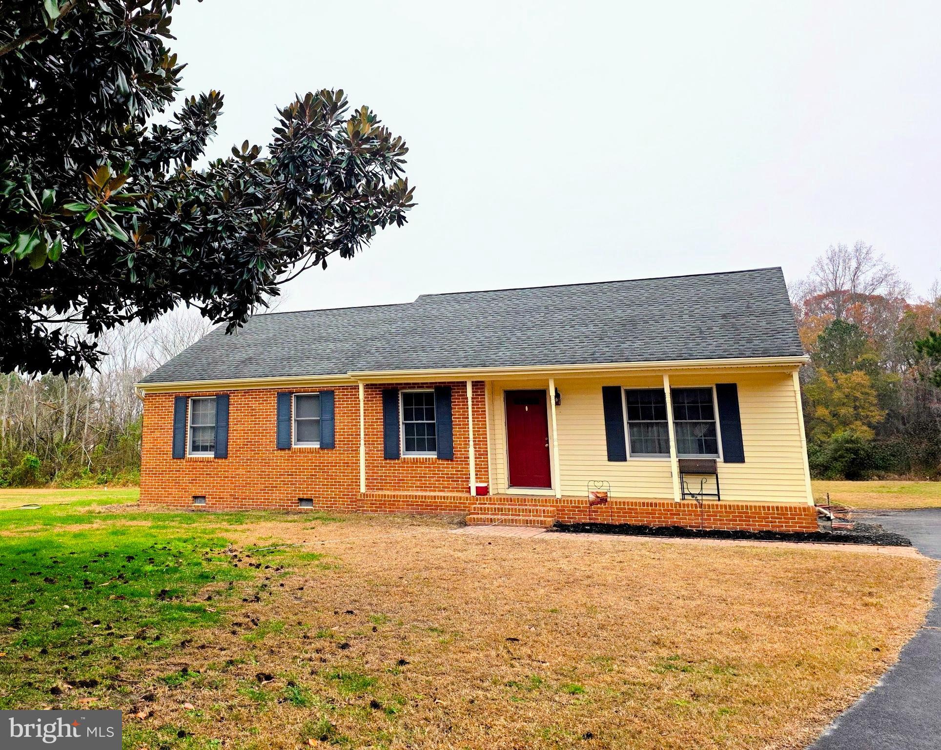 front view of house with a yard