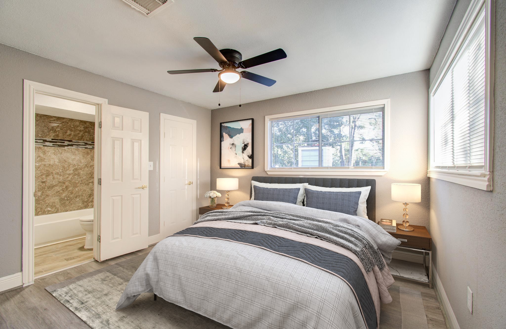 556 Brandon Road Conroe, TX 77302 - Photo 13 of 28 a bedroom with a large bed and a window