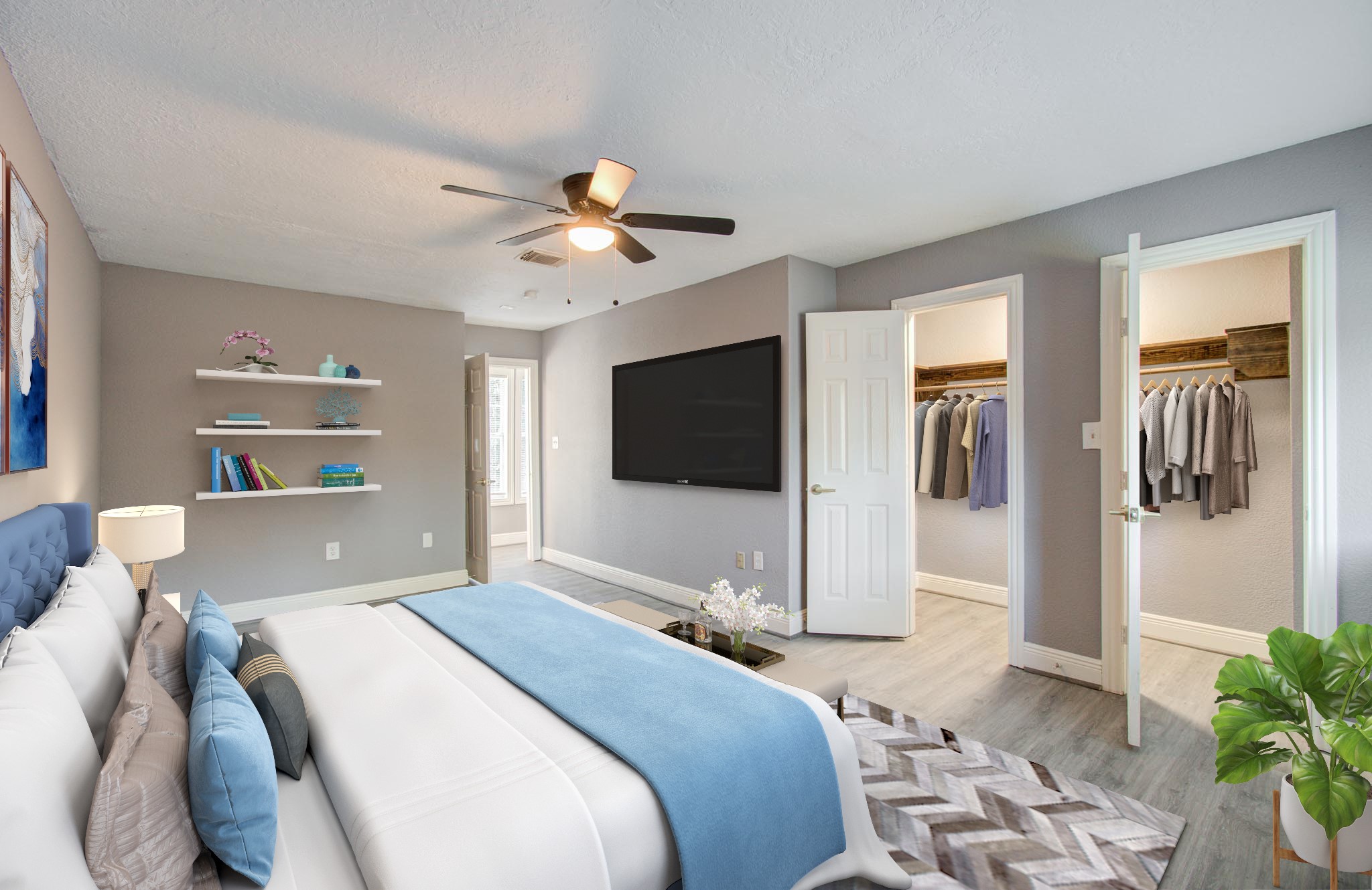556 Brandon Road Conroe, TX 77302 - Photo 9 of 28 a bedroom with a bed and a chandelier