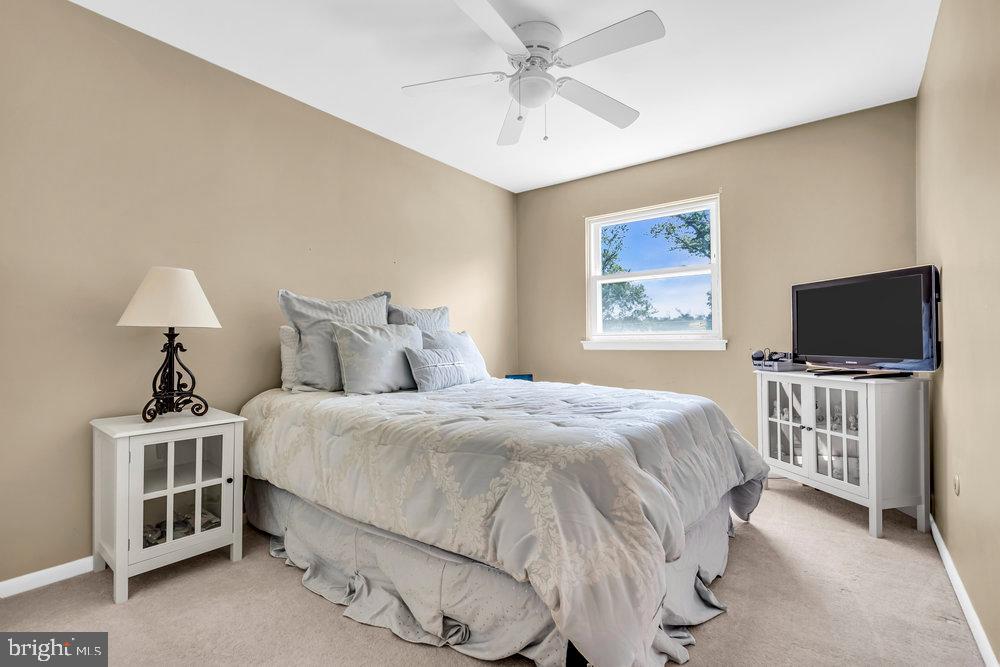 1964 East Oak Road, Unit K4 Vineland, NJ 08361 - Photo 16 of 25 a bedroom with a bed and a flat screen tv