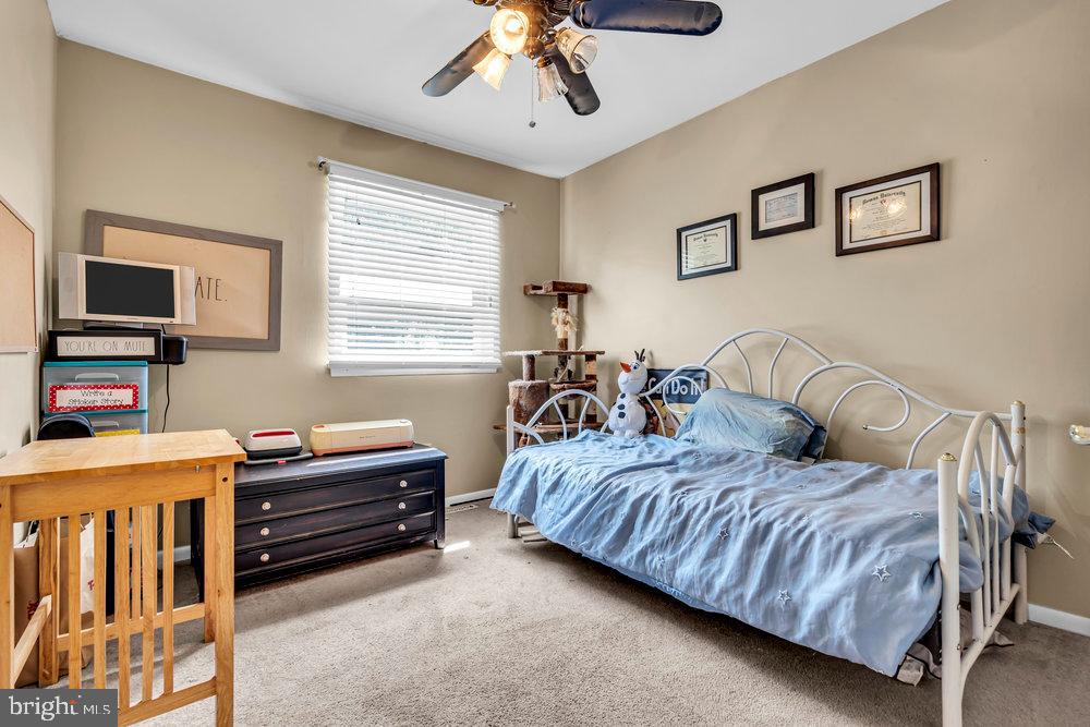 1964 East Oak Road, Unit K4 Vineland, NJ 08361 - Photo 17 of 25 a bedroom with a bed and a dresser