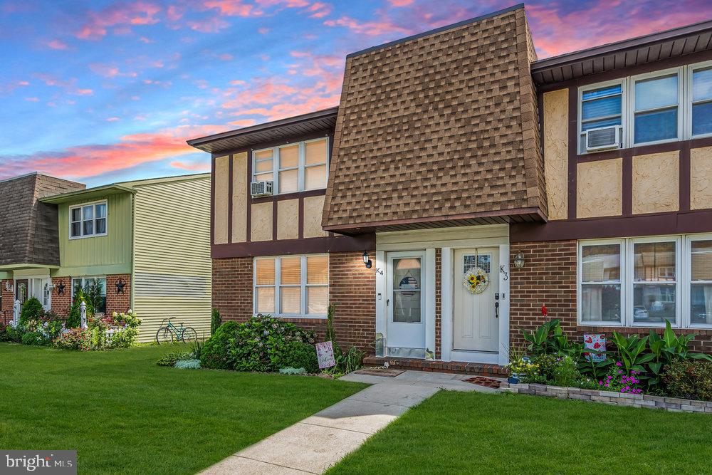 1964 East Oak Road, Unit K4 Vineland, NJ 08361 - Photo 2 of 25 a front view of a house with garden