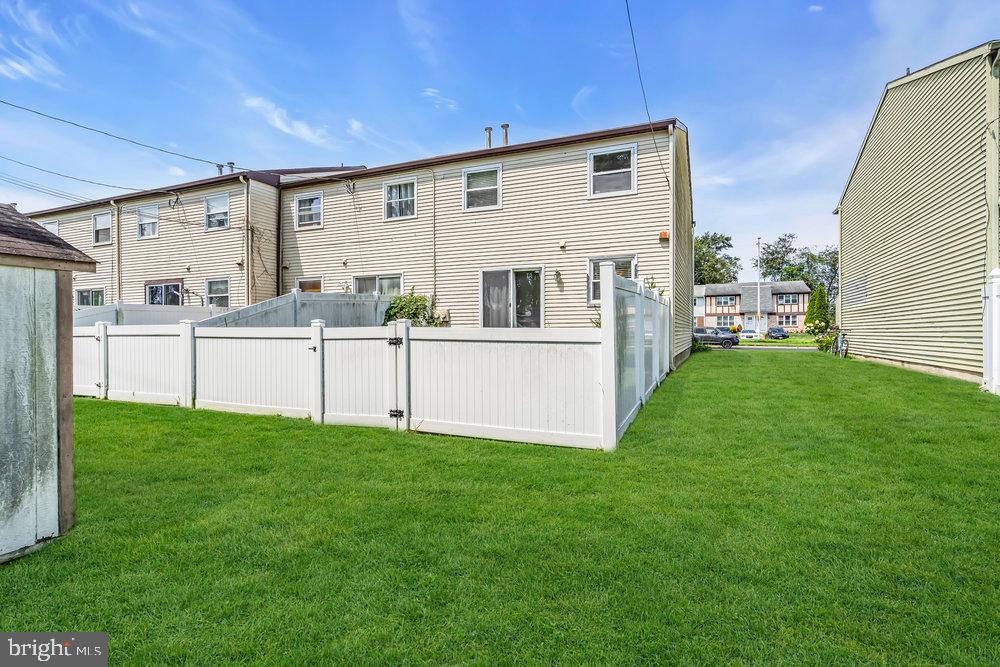 1964 East Oak Road, Unit K4 Vineland, NJ 08361 - Photo 21 of 25 a view of an house with backyard porch and furniture