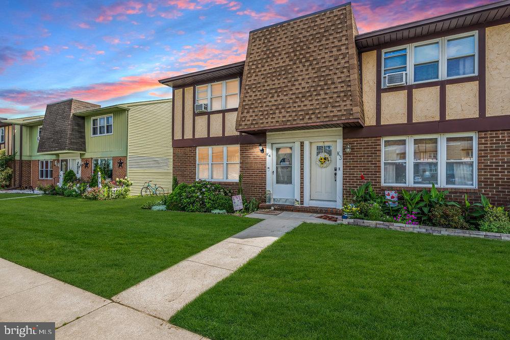 1964 East Oak Road, Unit K4 Vineland, NJ 08361 - Photo 3 of 25 a front view of a house with a yard