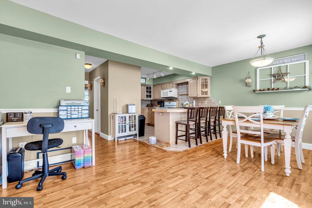 1964 East Oak Road, Unit K4 Vineland, NJ 08361 - Photo 9 of 25 a living room with furniture and a wooden floor