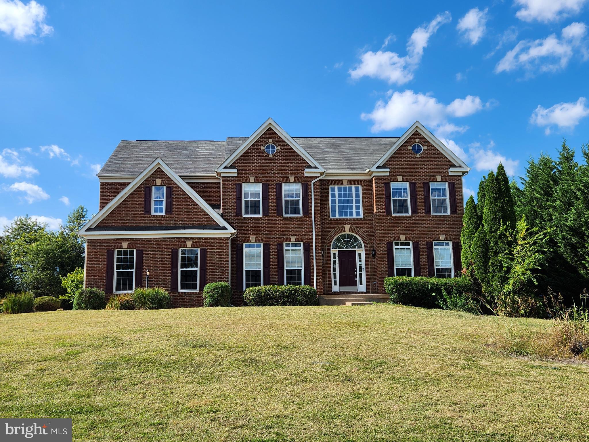 15117 Montanus Drive Culpeper, VA 22701 - Photo 1 of 27 a front view of a house with a yard