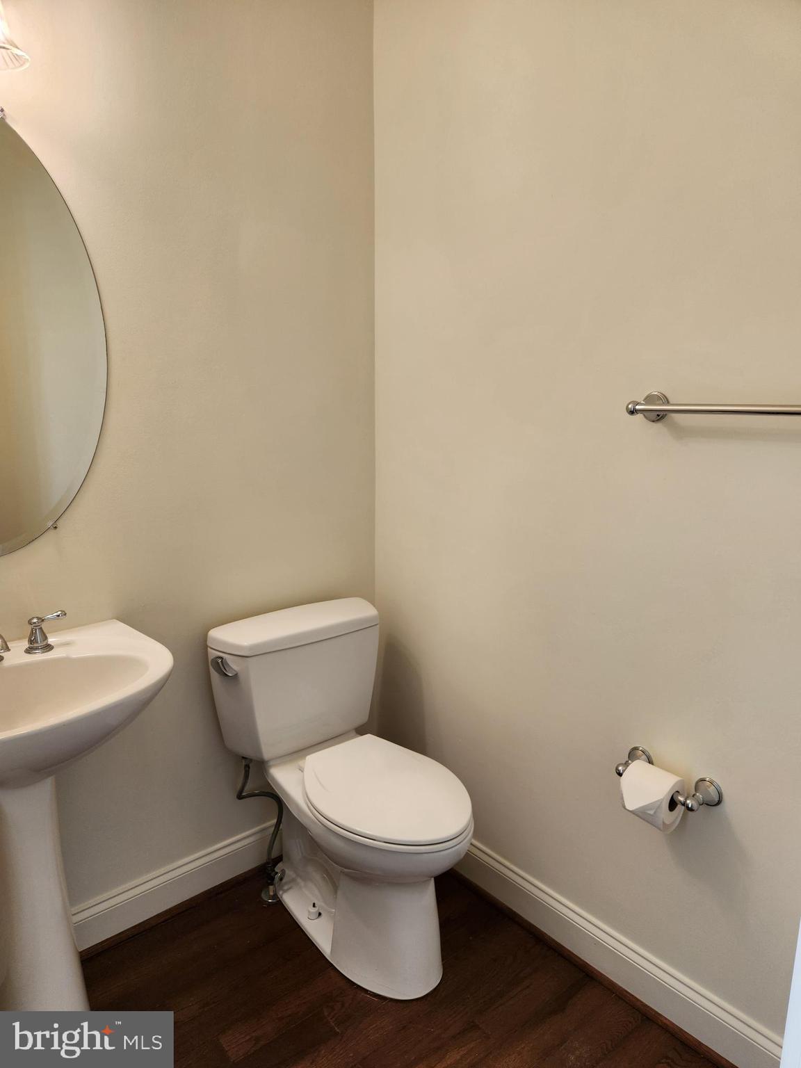 15117 Montanus Drive Culpeper, VA 22701 - Photo 12 of 27 a white toilet sitting next to a bathroom sink