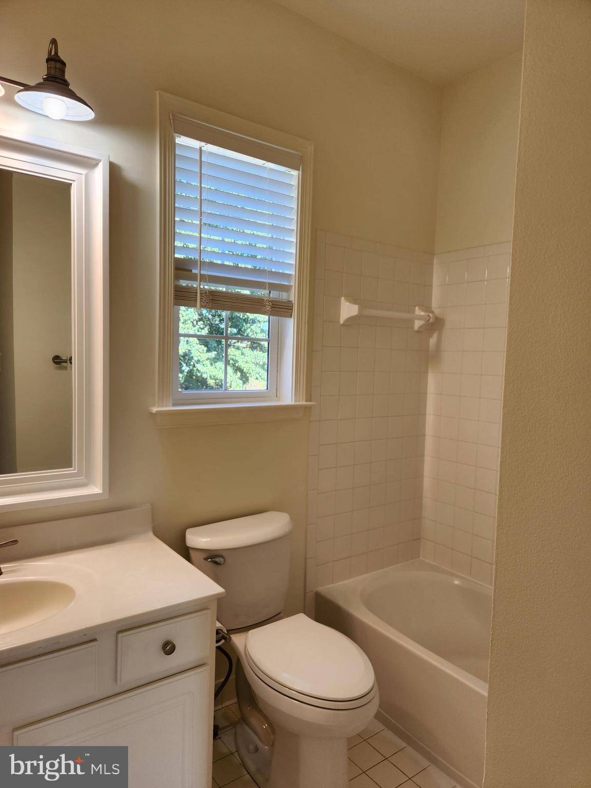 15117 Montanus Drive Culpeper, VA 22701 - Photo 18 of 27 a bathroom with a sink a toilet and shower