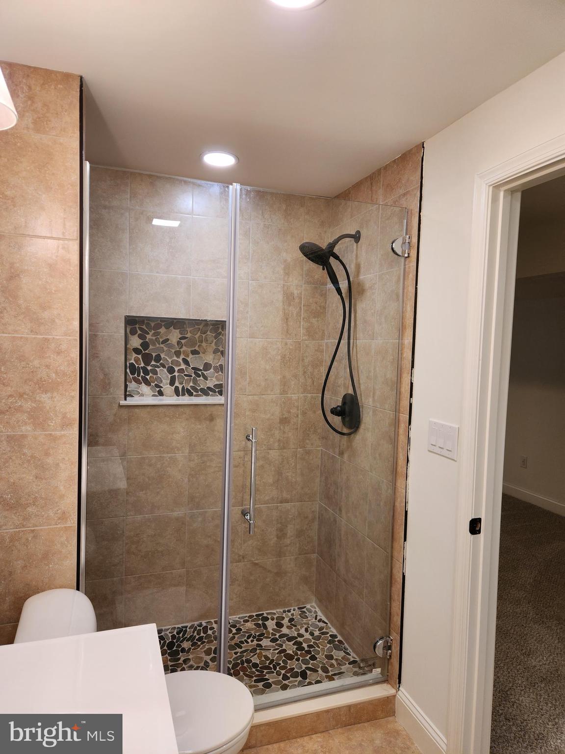 15117 Montanus Drive Culpeper, VA 22701 - Photo 26 of 27 a bathroom with a shower