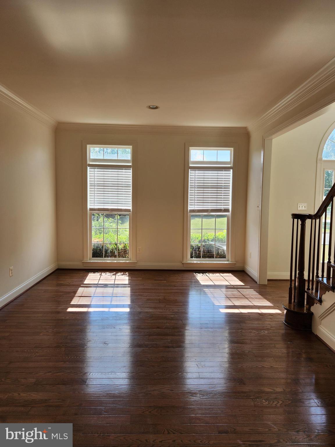 15117 Montanus Drive Culpeper, VA 22701 - Photo 4 of 27 a view of empty room with wooden floor and fan