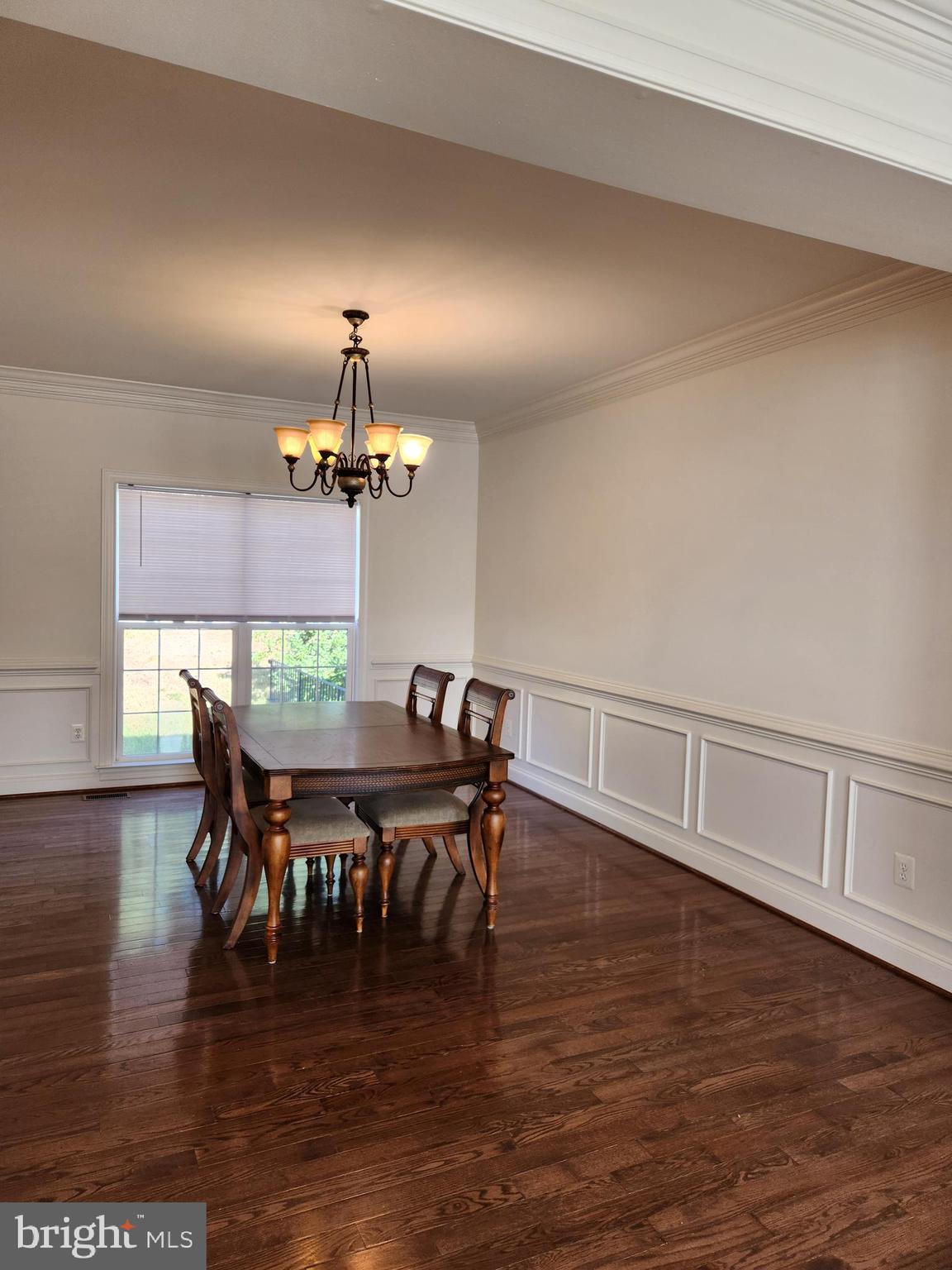 15117 Montanus Drive Culpeper, VA 22701 - Photo 7 of 27 a view of a dining room with furniture window and wooden floor