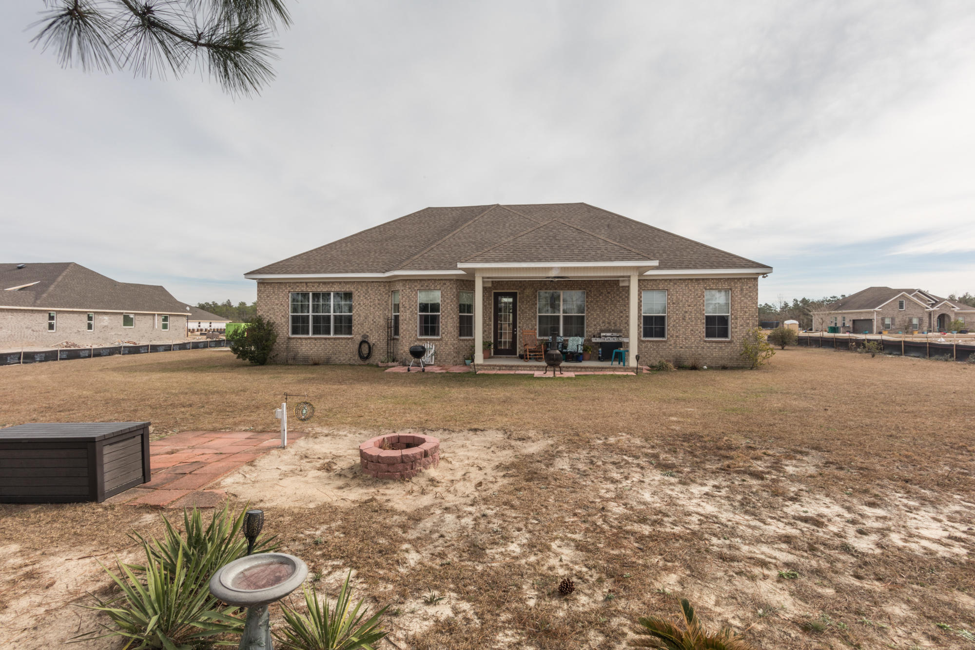 331 Brushed Dunes Circle Freeport, FL 32439 - Photo 15 of 60 a house with swimming pool in front of it