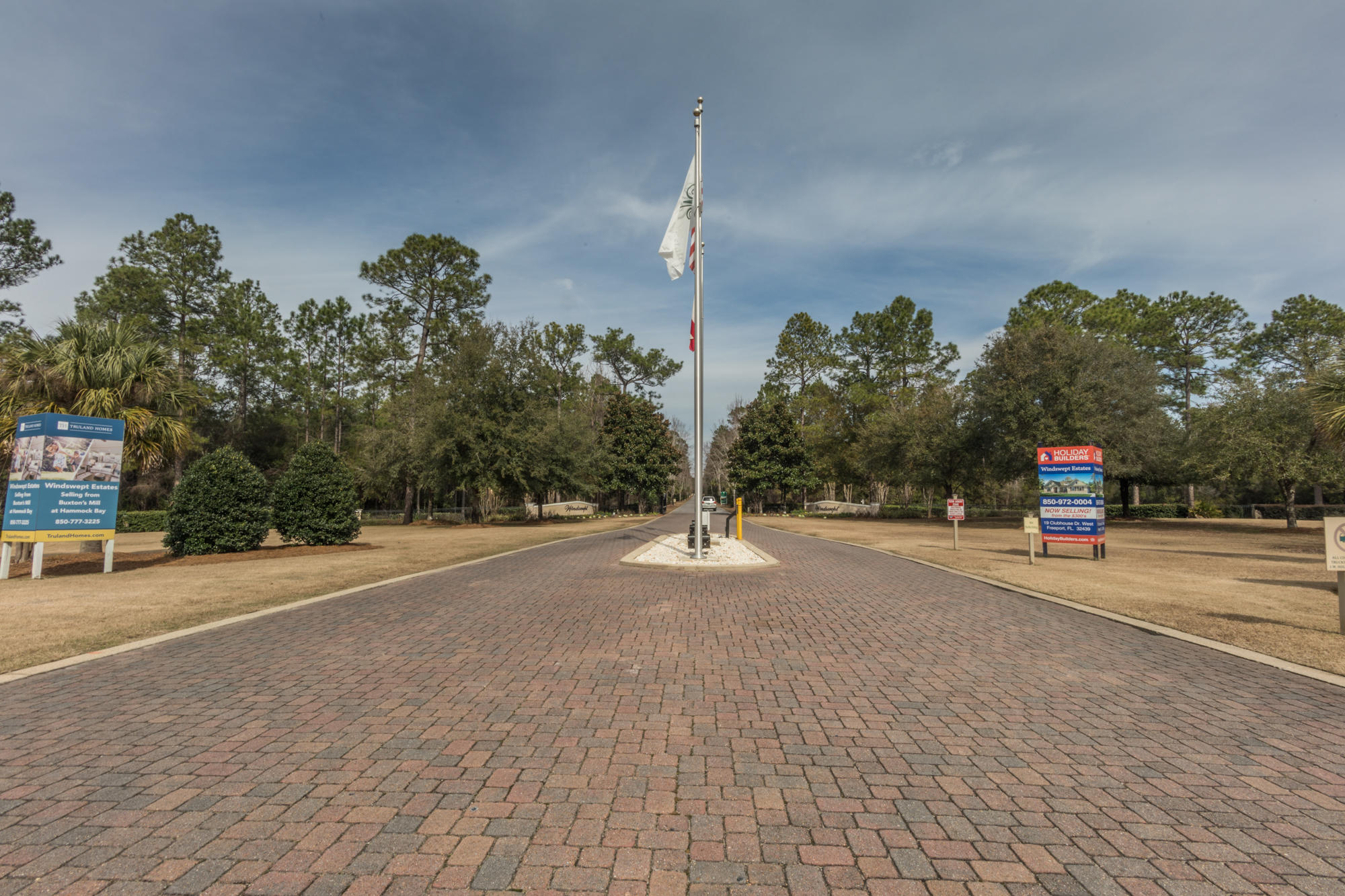 331 Brushed Dunes Circle Freeport, FL 32439 - Photo 22 of 60 a view of a road with a building in the background