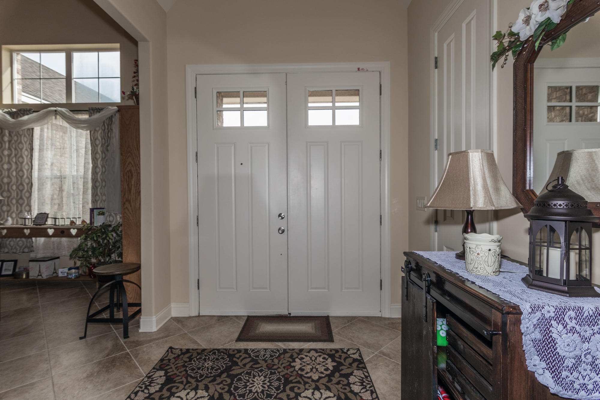 331 Brushed Dunes Circle Freeport, FL 32439 - Photo 3 of 60 a room with furniture and a potted plant