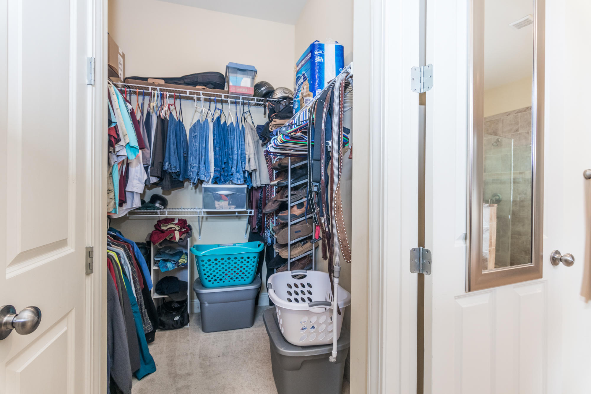331 Brushed Dunes Circle Freeport, FL 32439 - Photo 38 of 60 a view of walk in closet with clothes and shoes