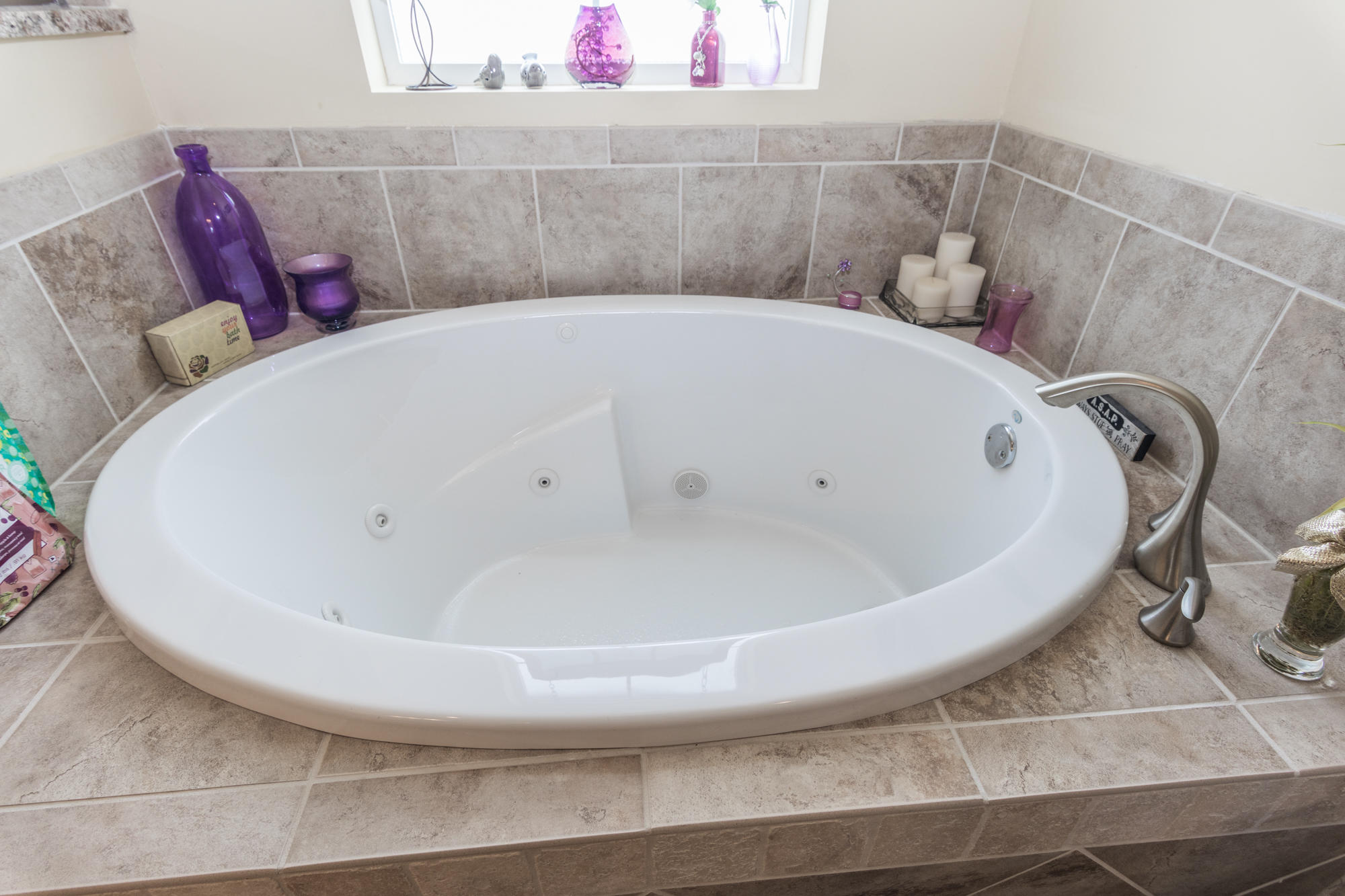 331 Brushed Dunes Circle Freeport, FL 32439 - Photo 39 of 60 a white bath tub sitting in a bathroom