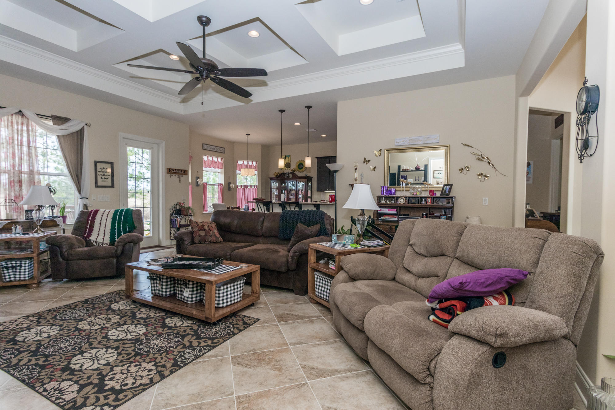 331 Brushed Dunes Circle Freeport, FL 32439 - Photo 4 of 60 a living room with furniture and a ceiling fan