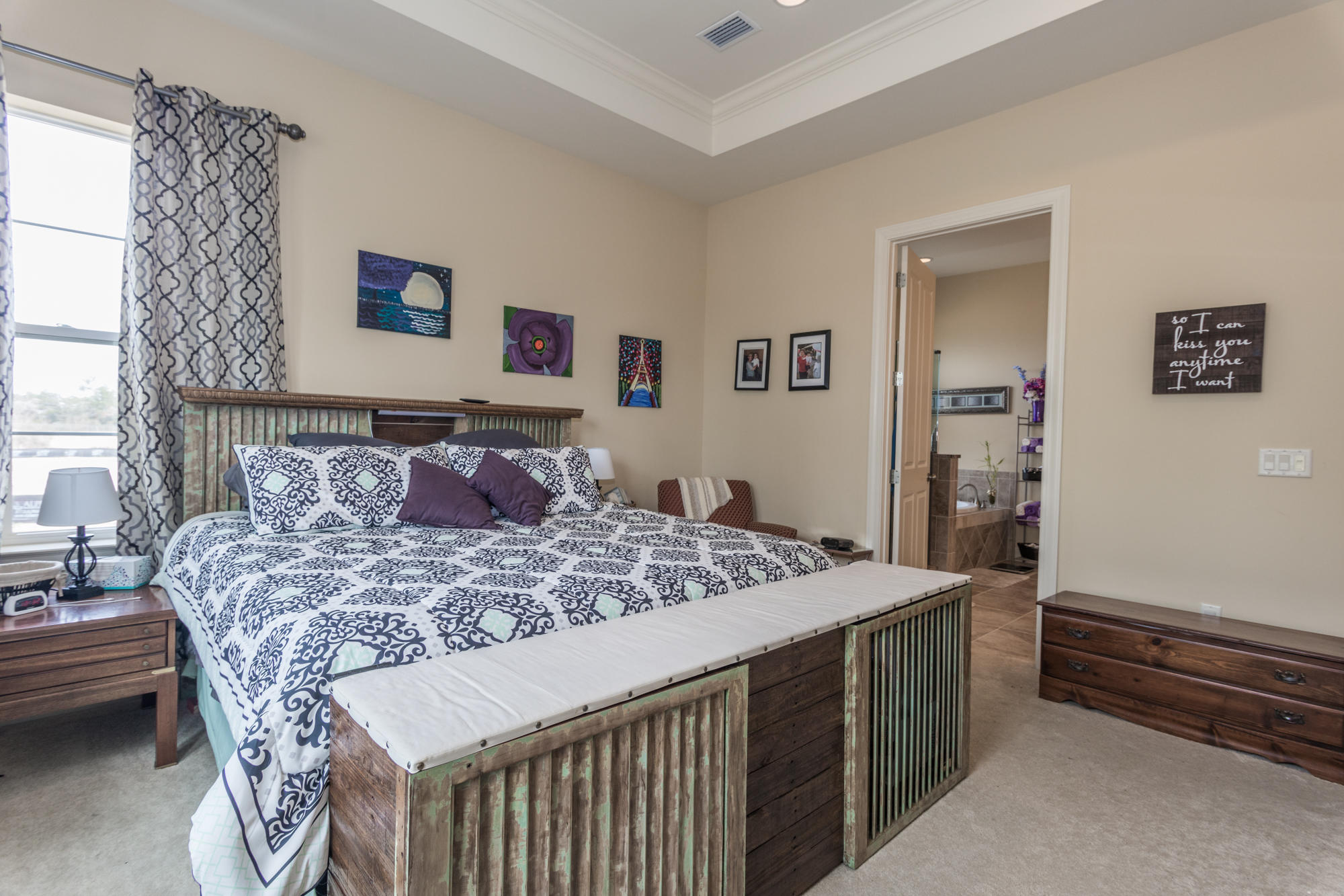 331 Brushed Dunes Circle Freeport, FL 32439 - Photo 44 of 60 a bed sitting in a bedroom next to a window