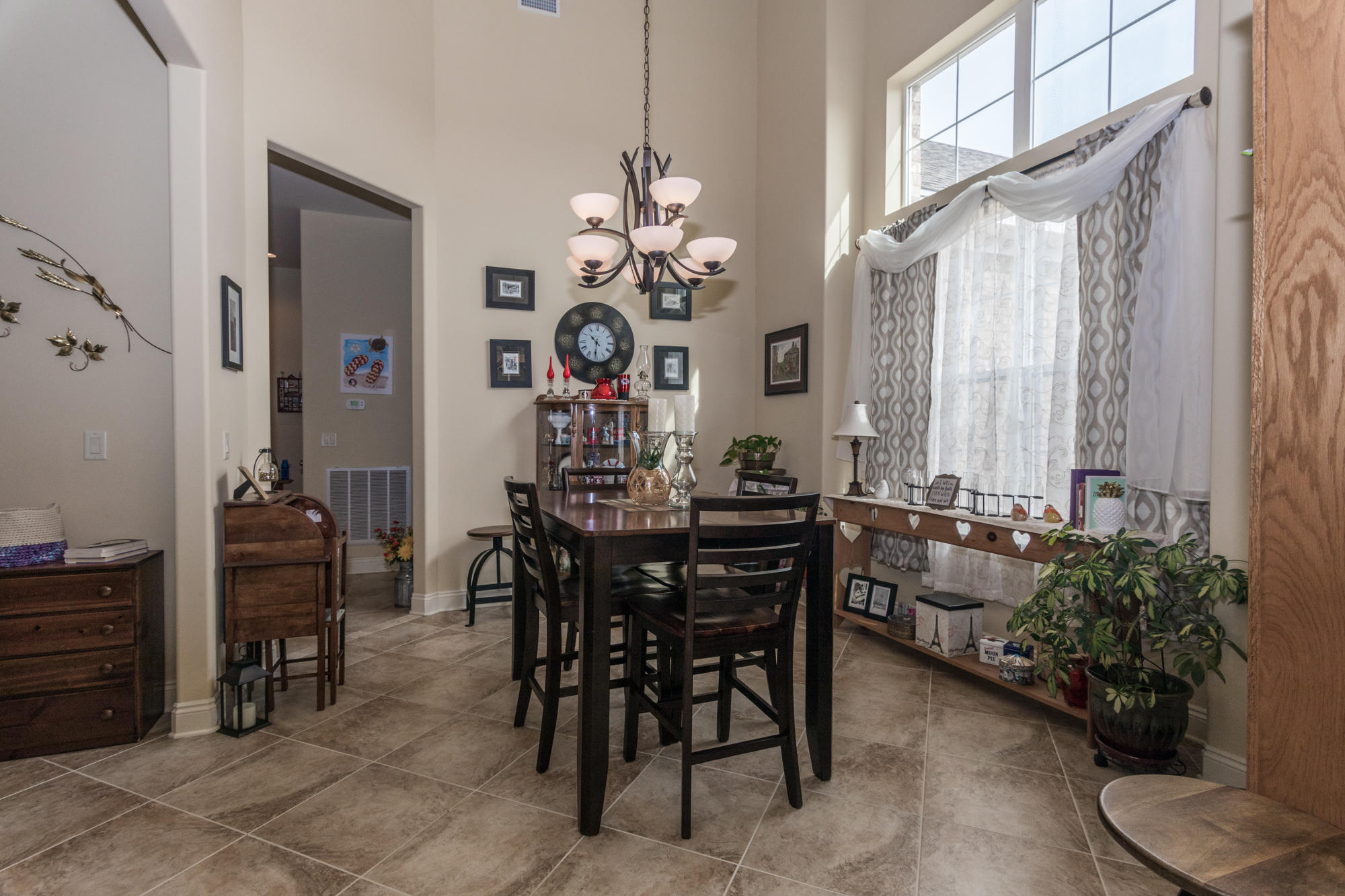 331 Brushed Dunes Circle Freeport, FL 32439 - Photo 54 of 60 a view of a dining room with furniture and chandelier
