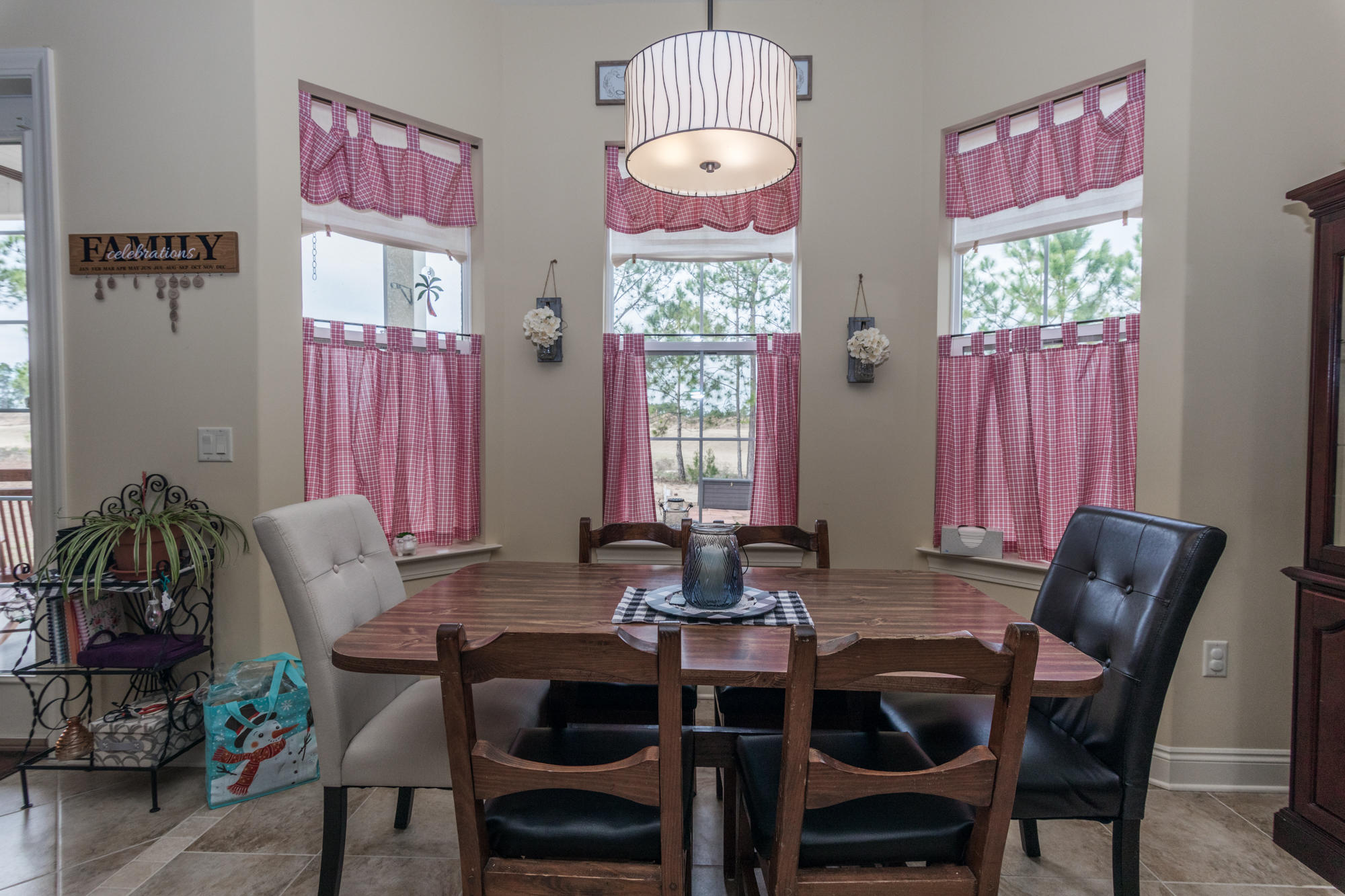 331 Brushed Dunes Circle Freeport, FL 32439 - Photo 9 of 60 a view of a dining room with furniture window and outside view