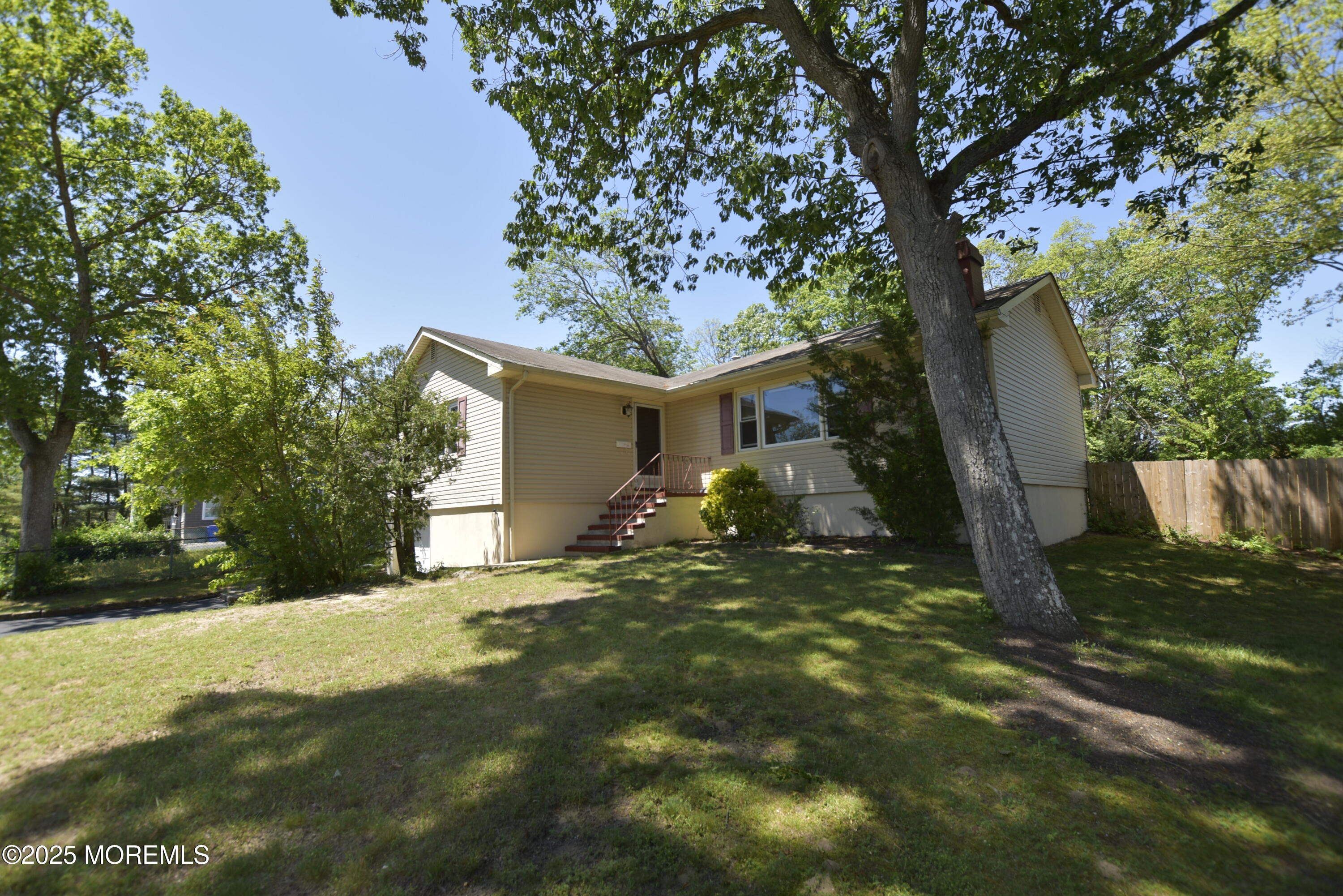 1595 Forge Pond Road Brick, NJ 08724 - Photo 14 of 35 a view of a house with yard and a tree