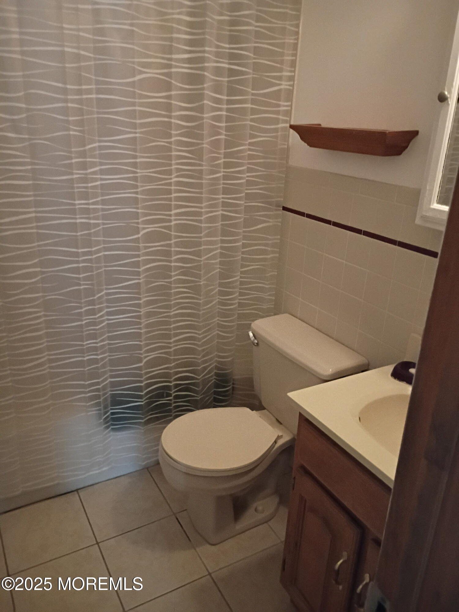 1595 Forge Pond Road Brick, NJ 08724 - Photo 19 of 35 a white toilet sitting next to a white wall