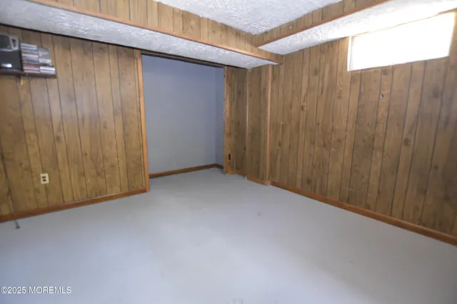 a view of hallway with windows