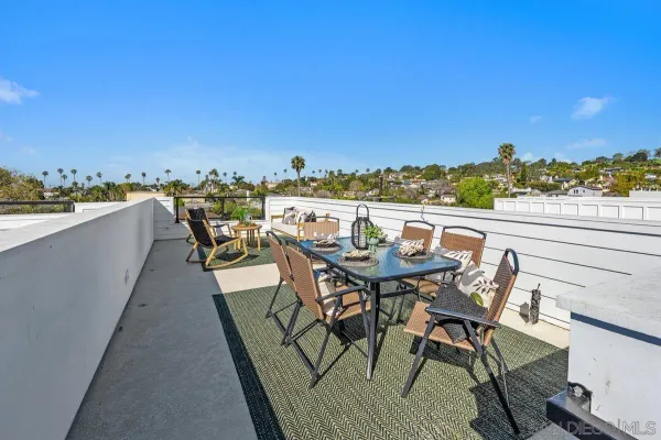 a view of a terrace with furniture