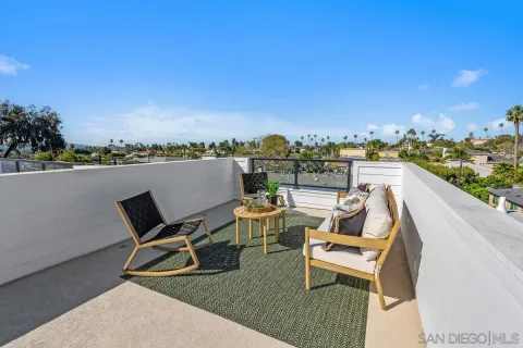 a view of a terrace with chairs