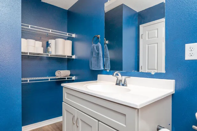 a bathroom with a shower curtain and a curtain