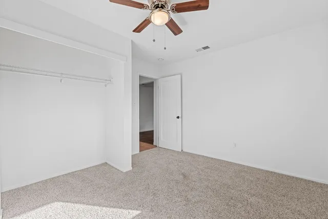 a kitchen with stainless steel appliances granite countertop a sink a stove and a microwave