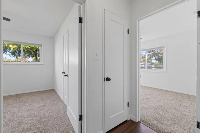 a bathroom with a sink vanity and a mirror