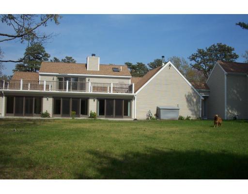 61 Bullivant Farm Road Marion, MA 02738 - Photo 11 of 14 a front view of a house with a garden