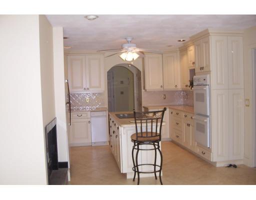 61 Bullivant Farm Road Marion, MA 02738 - Photo 2 of 14 a living room with furniture and a chandelier