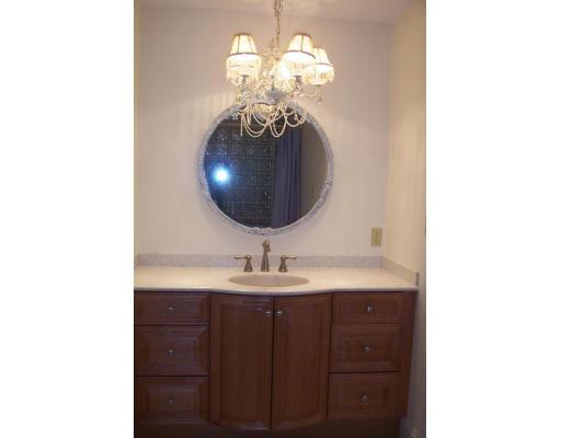 61 Bullivant Farm Road Marion, MA 02738 - Photo 6 of 14 a bathroom with a sink and a mirror