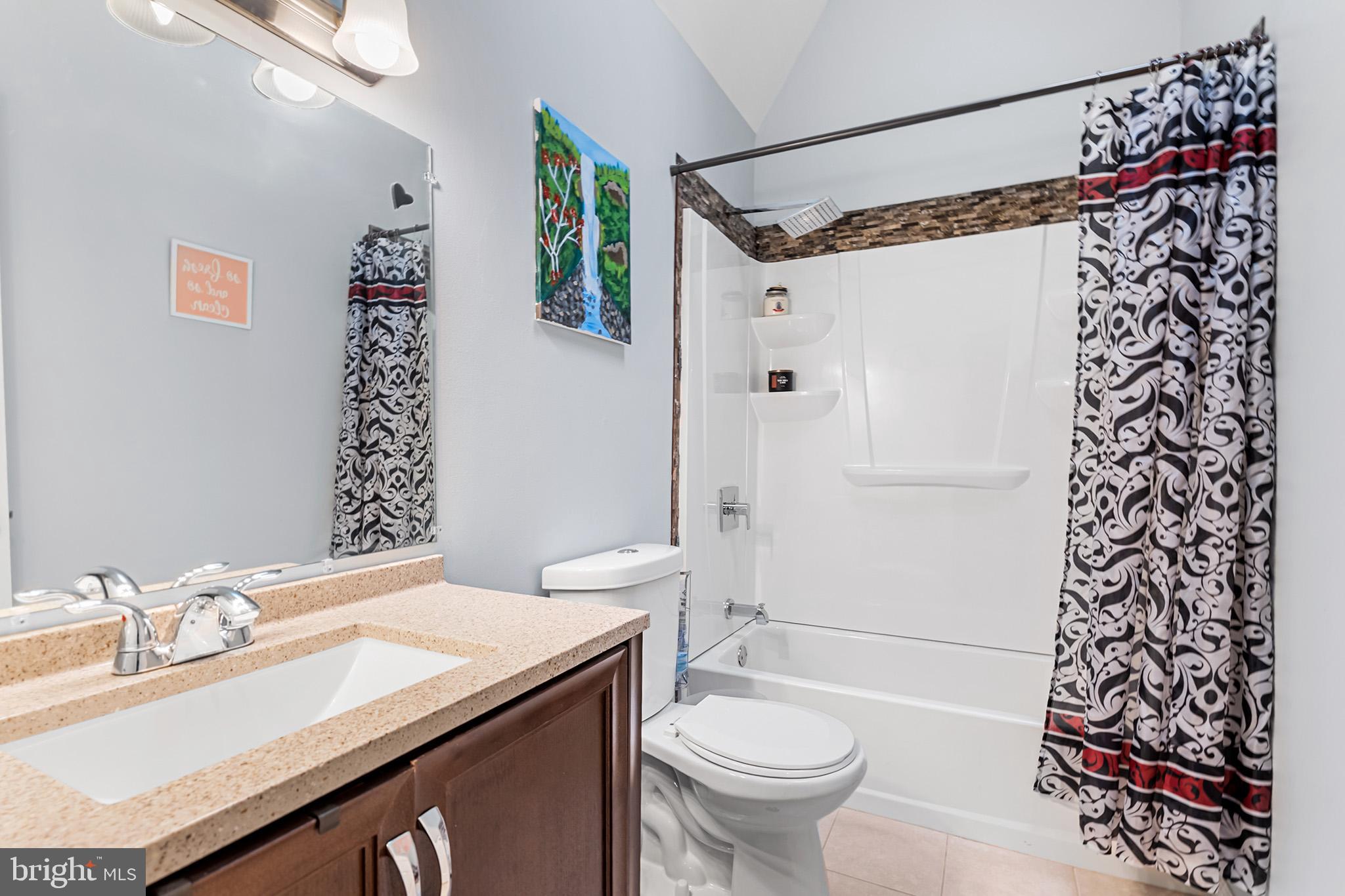 3808 Walnut Ridge Estate Pottstown, PA 19464 - Photo 16 of 30 a bathroom with a sink toilet and shower