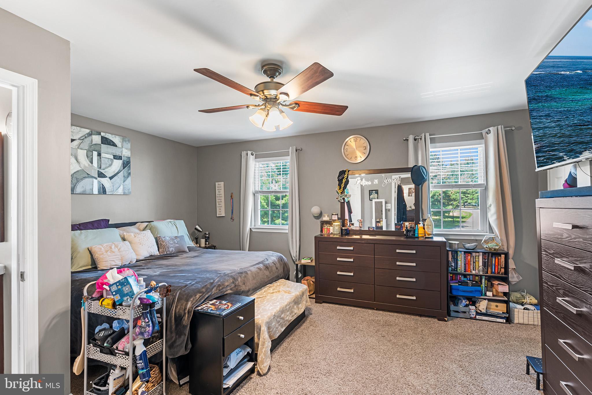 3808 Walnut Ridge Estate Pottstown, PA 19464 - Photo 19 of 30 a bedroom with a bed and a large window