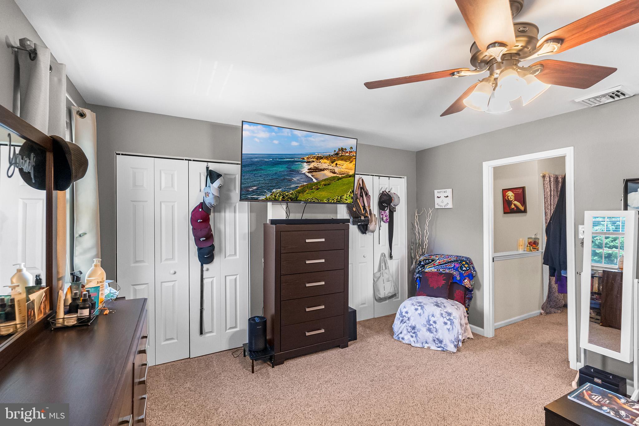 3808 Walnut Ridge Estate Pottstown, PA 19464 - Photo 21 of 30 a bedroom with a bed and a chandelier