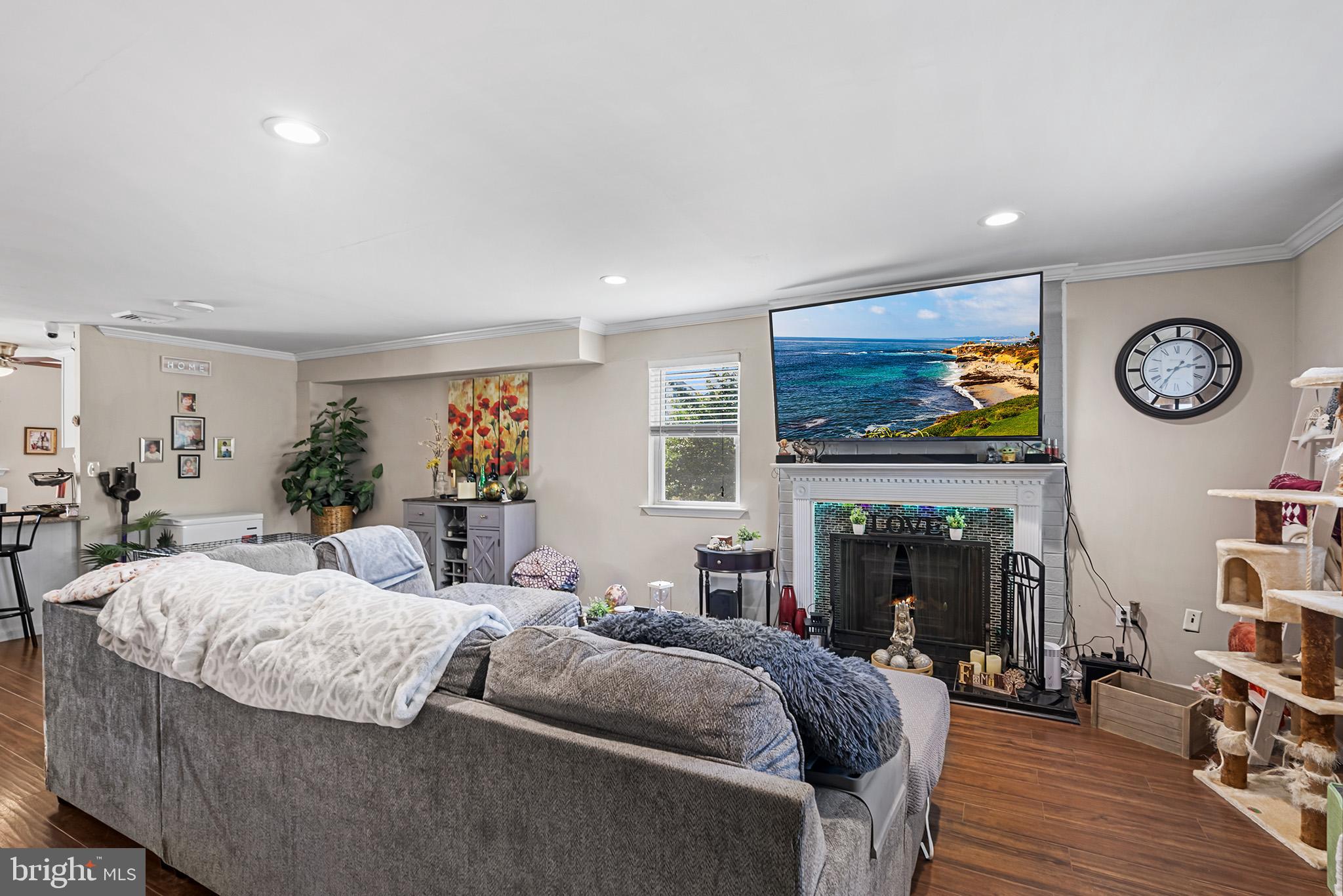 3808 Walnut Ridge Estate Pottstown, PA 19464 - Photo 3 of 30 a living room with furniture and a fireplace
