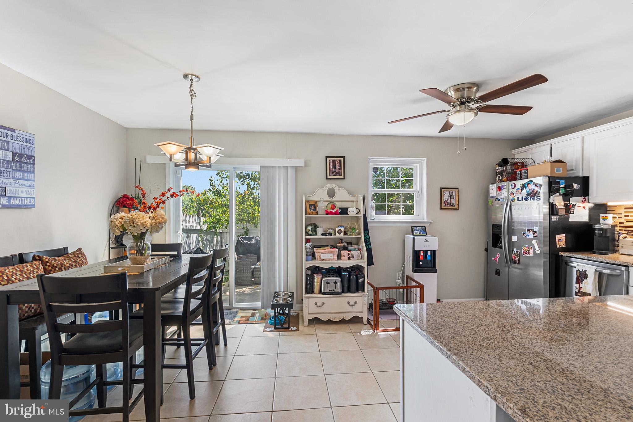 3808 Walnut Ridge Estate Pottstown, PA 19464 - Photo 9 of 30 a view of a dining room with furniture window and wooden floor