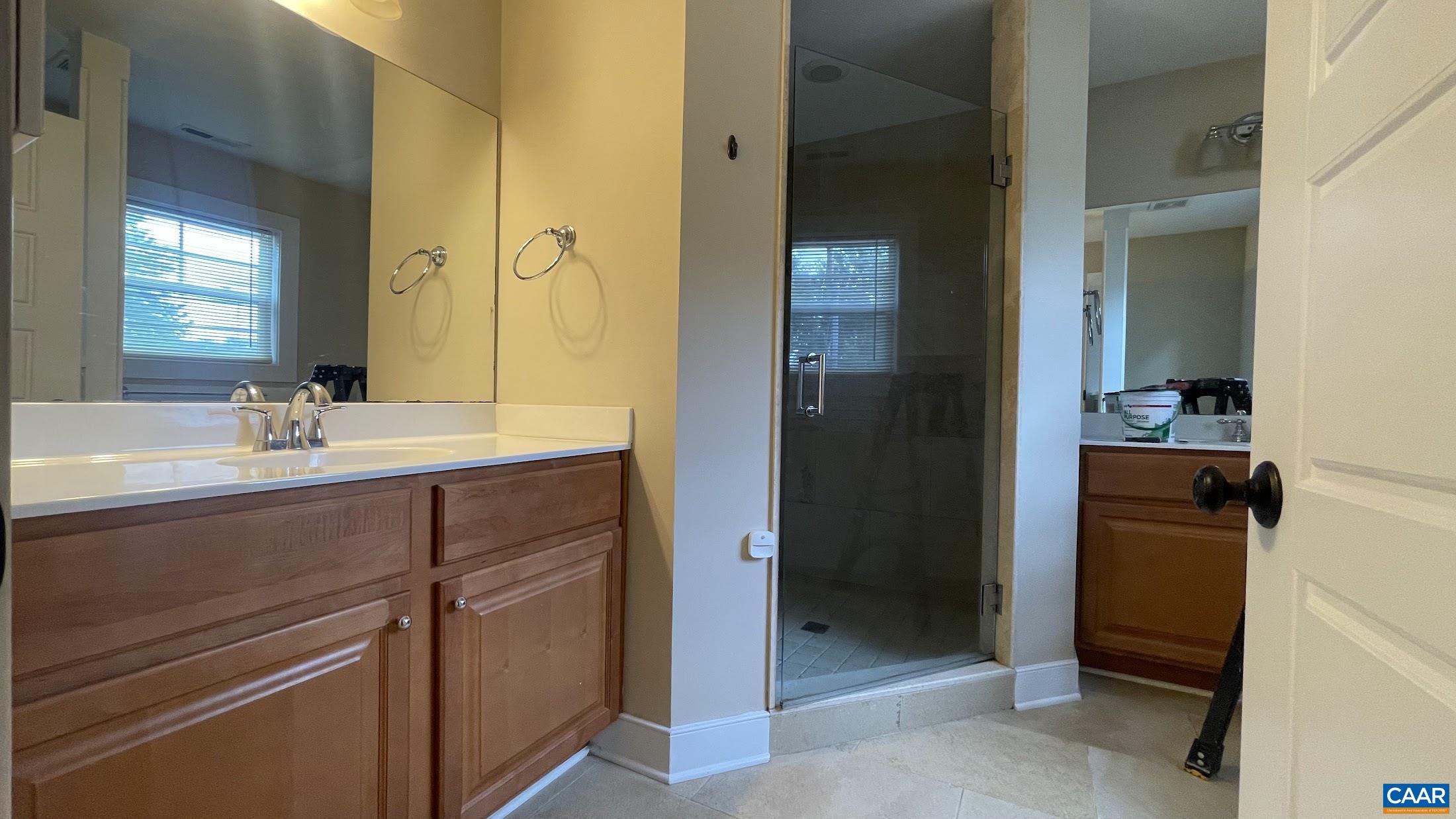 200 Harris Road Charlottesville, VA 22903 - Photo 22 of 28 a bathroom with a sink and a mirror