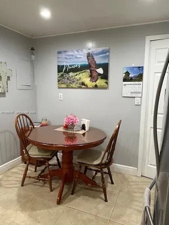 a view of a dining room with furniture