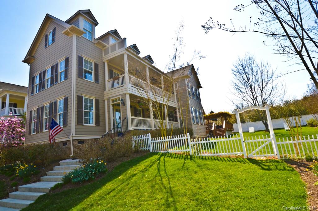 704 Shady Grove Crossing, Unit 496 Fort Mill, SC 29708 - Photo 1 of 20 a view of a house with a yard and plants