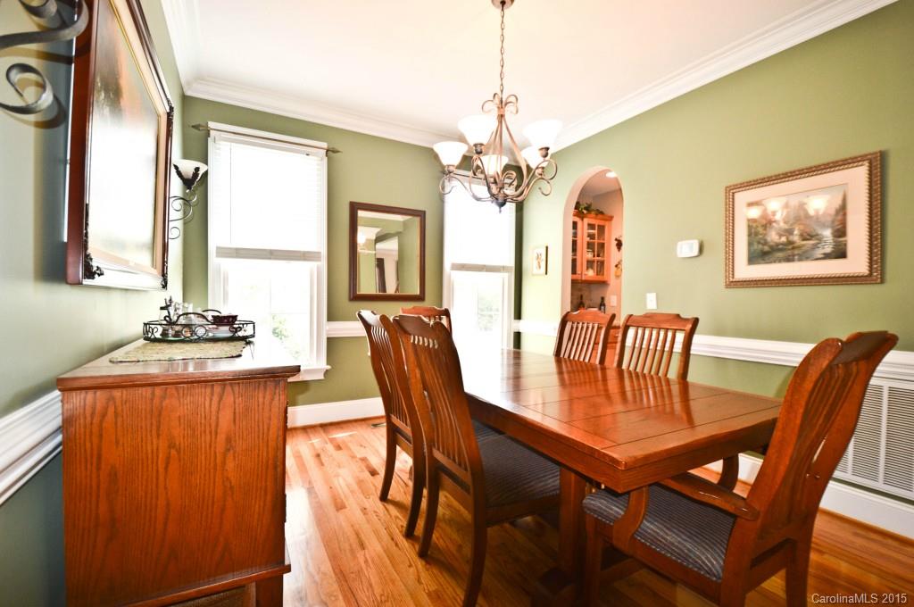 704 Shady Grove Crossing, Unit 496 Fort Mill, SC 29708 - Photo 13 of 20 a view of a dining room with furniture window and outside view