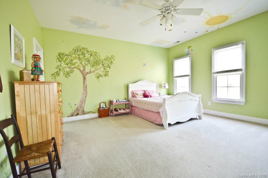 704 Shady Grove Crossing, Unit 496 Fort Mill, SC 29708 - Photo 15 of 20 a bedroom with a bed and a window