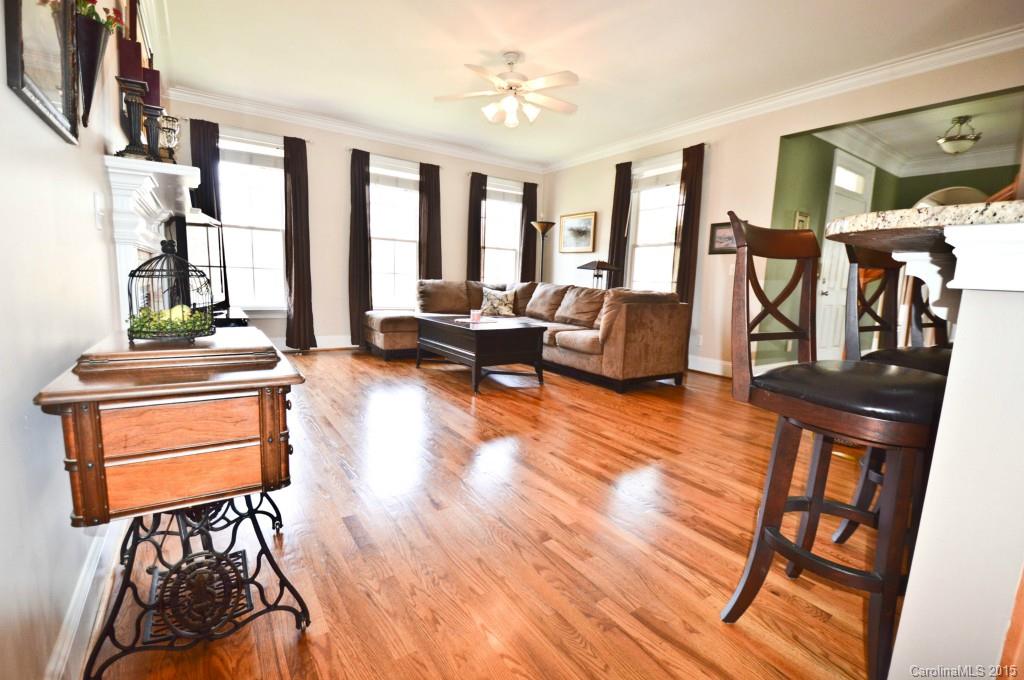 704 Shady Grove Crossing, Unit 496 Fort Mill, SC 29708 - Photo 5 of 20 a living room with furniture and a table