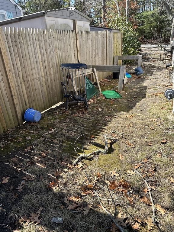 163 Ninigret Avenue Mashpee, MA 02649 - Photo 14 of 17 a view of outdoor space and yard